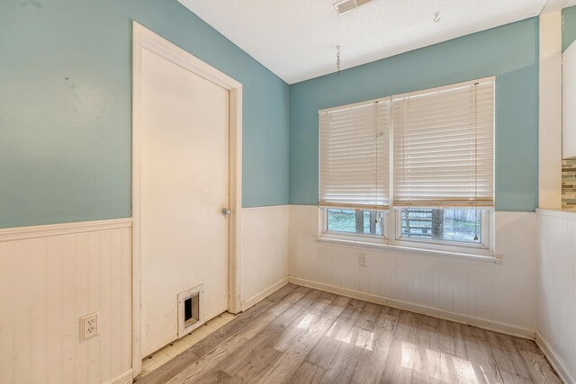 4606 Moss Ct, North Charleston, SC 29420 - unfurnished room featuring a wainscoted wall and wood finished floors