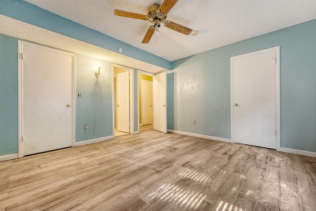 4606 Moss Ct, North Charleston, SC 29420 - unfurnished bedroom with wood finished floors, baseboards, a textured ceiling, and ceiling fan