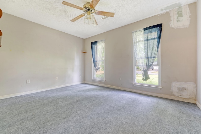 4606 Moss Ct, North Charleston, SC 29420 - spare room with a textured ceiling, carpet flooring, a ceiling fan, and baseboards
