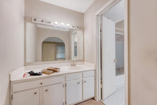 4606 Moss Ct, North Charleston, SC 29420 - full bathroom featuring vanity, a textured ceiling, and shower / washtub combination