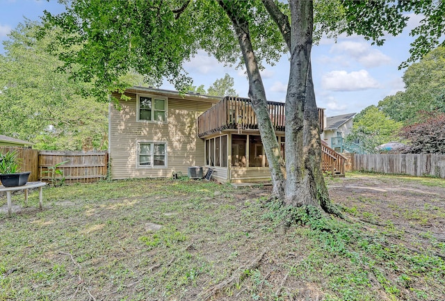 4606 Moss Ct, North Charleston, SC 29420 - rear view of house with a fenced backyard, a deck, a sunroom, and stairway