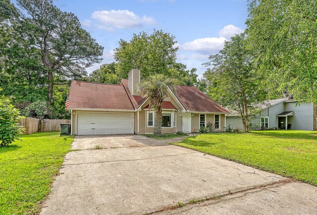 4606 Moss Ct, North Charleston, SC 29420 - view of front of home featuring an attached garage, concrete driveway, and a chimney