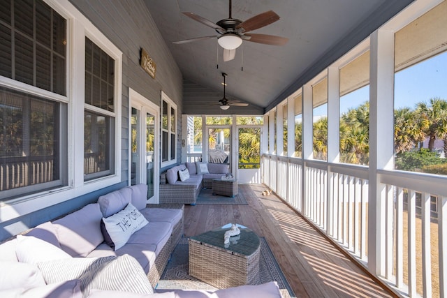 sunroom with vaulted ceiling and ceiling fan