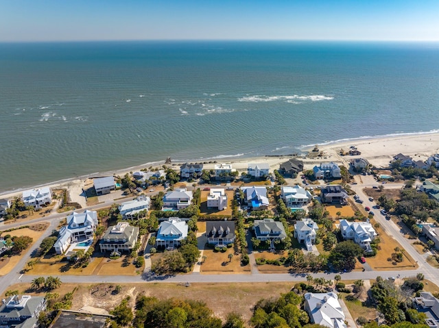 aerial view with a view of the beach and a water view