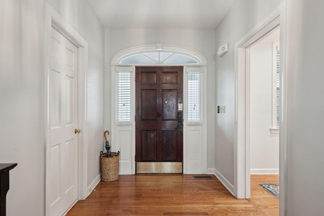 entrance foyer with hardwood / wood-style floors