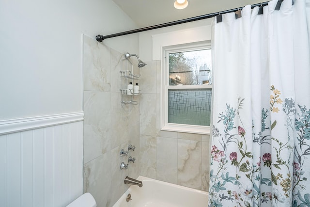 bathroom with shower / tub combo