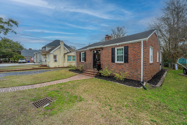 view of front of home with a front yard