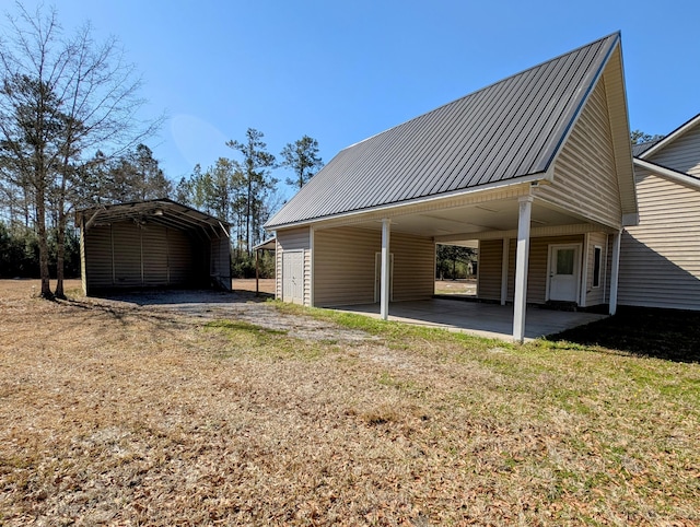 garage with a detached carport