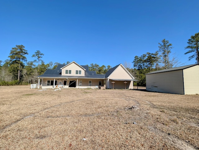 back of house with covered porch