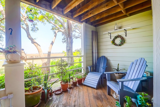 exterior space with beam ceiling