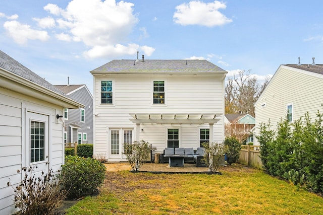 back of house featuring a yard, a pergola, an outdoor living space, and a patio area