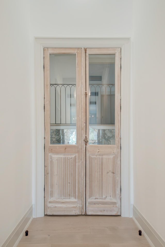 details featuring baseboards and wood finished floors