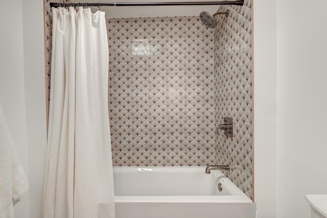 bathroom with shower / bath combination with curtain