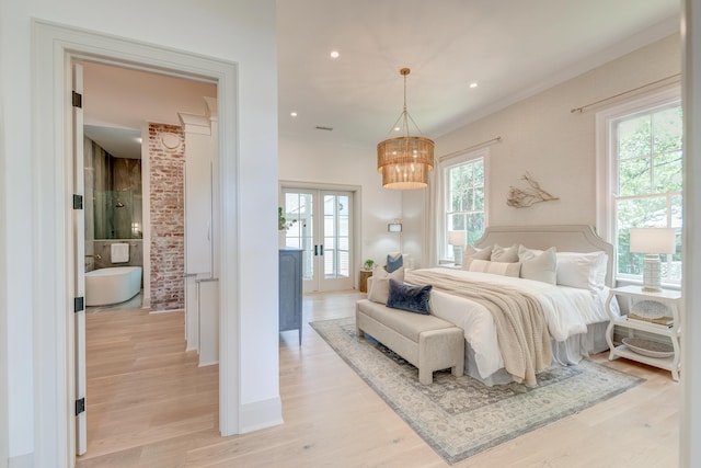 bedroom with light wood-type flooring, visible vents, a notable chandelier, recessed lighting, and crown molding