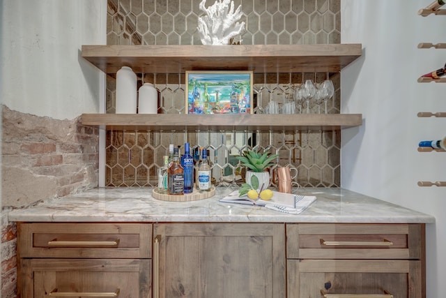 bar featuring decorative backsplash