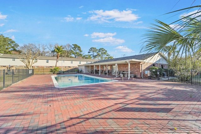 view of pool with a patio area