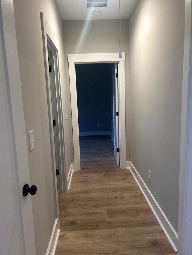 hall featuring hardwood / wood-style floors