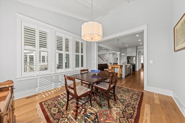 1962 Bellona St, Charleston, SC 29492 - dining space featuring beamed ceiling, wood finished floors, visible vents, and baseboards