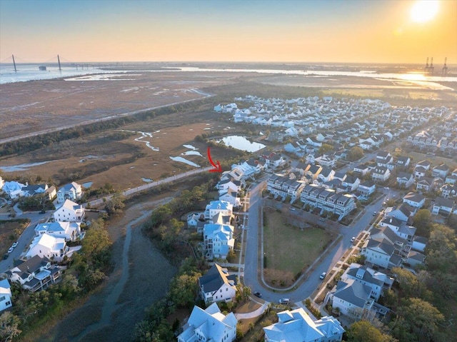 birds eye view of property with a residential view