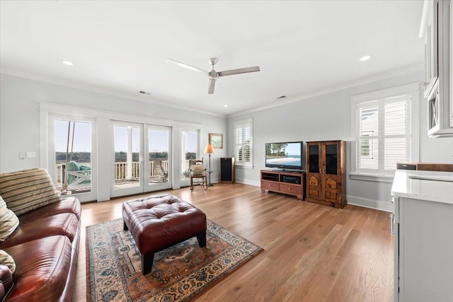 1962 Bellona St, Charleston, SC 29492 - living room featuring ceiling fan, recessed lighting, baseboards, light wood-type flooring, and crown molding