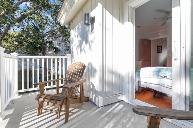 balcony featuring ceiling fan and covered porch