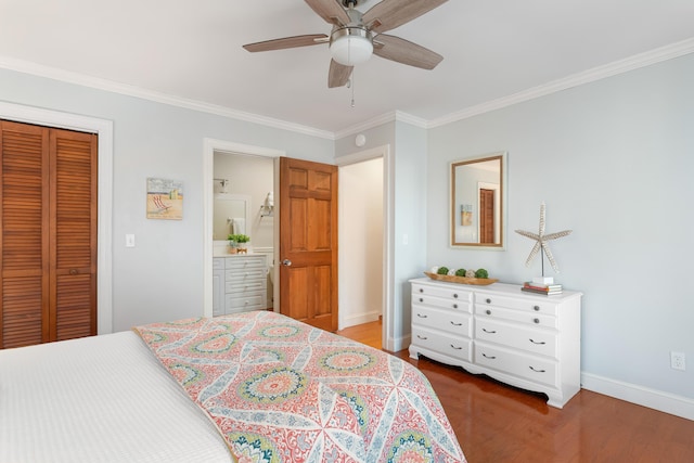 bedroom featuring ensuite bath, ceiling fan, dark hardwood / wood-style floors, ornamental molding, and a closet