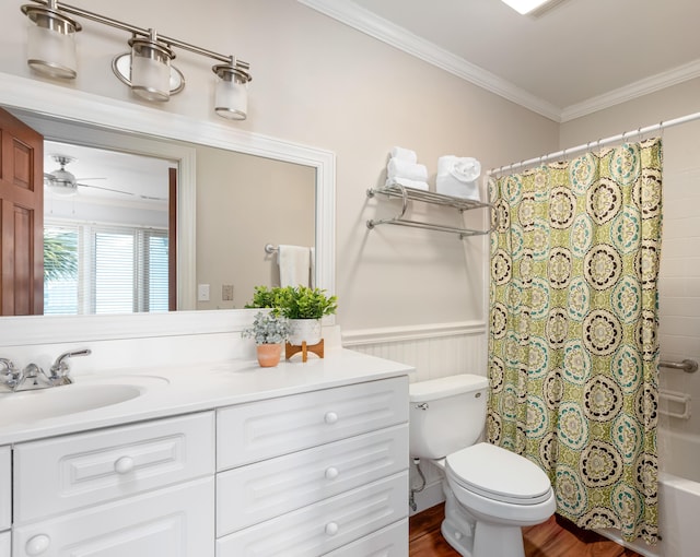 full bathroom featuring vanity, shower / bath combination with curtain, crown molding, toilet, and wood-type flooring