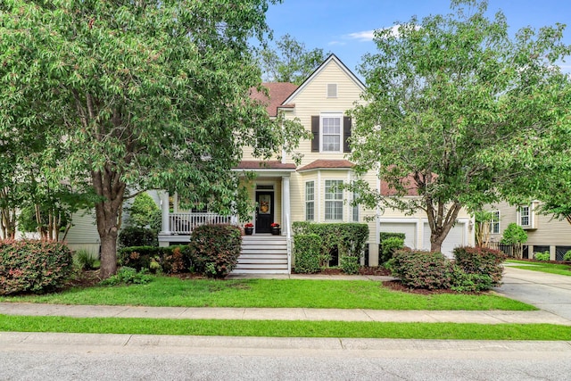 1664 William Hapton Way, Mount Pleasant, SC 29466 - view of front of home featuring concrete driveway, covered porch, stairs, a shingled roof, and a garage