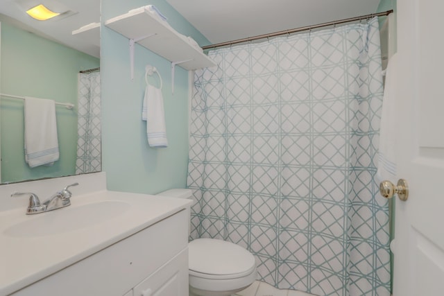 bathroom featuring walk in shower, vanity, and toilet