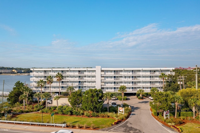 view of property with a water view