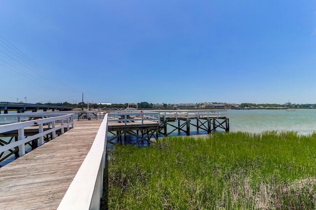 view of dock with a water view