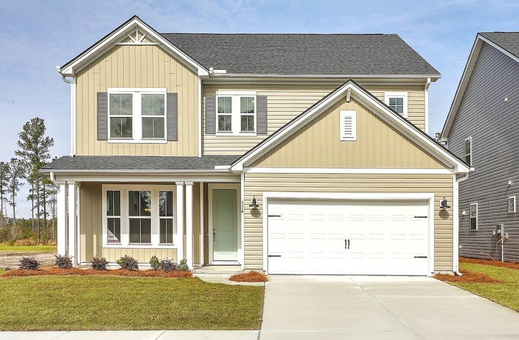 156 Middleton Dr, Goose Creek, SC 29445 - view of front facade featuring a front lawn and a garage