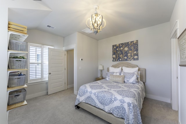 carpeted bedroom with a chandelier, baseboards, and vaulted ceiling