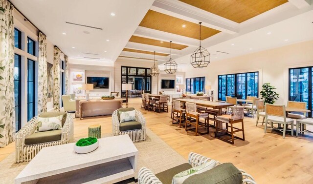 community lobby featuring beam ceiling, recessed lighting, and coffered ceiling