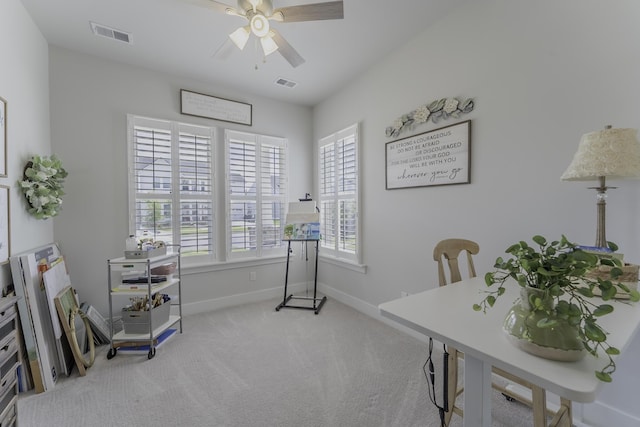 office space featuring ceiling fan, carpet, and baseboards