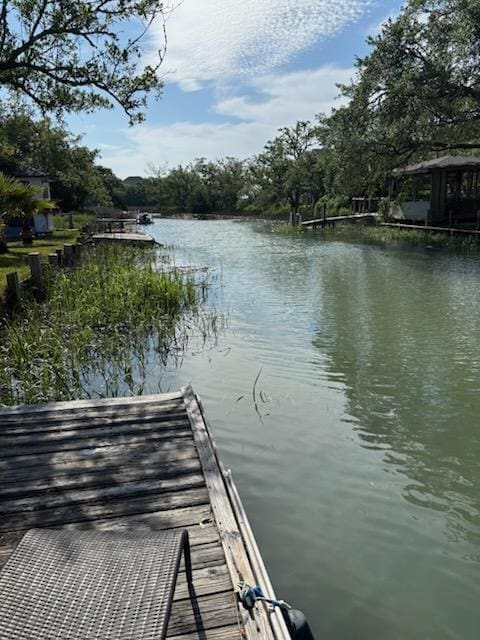 dock area featuring a water view