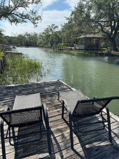 dock area featuring a water view