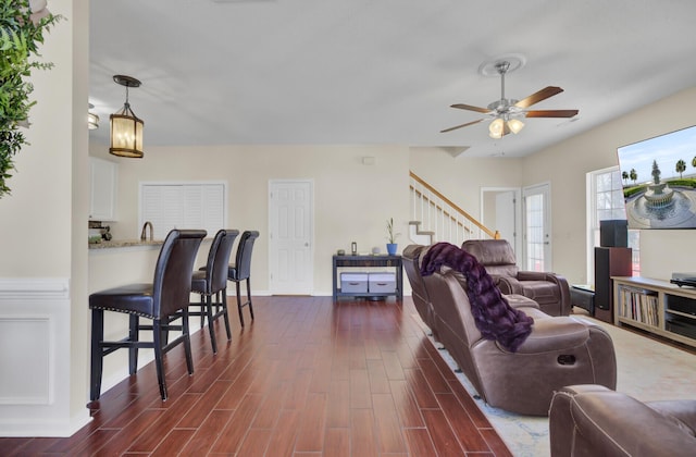 living room with ceiling fan