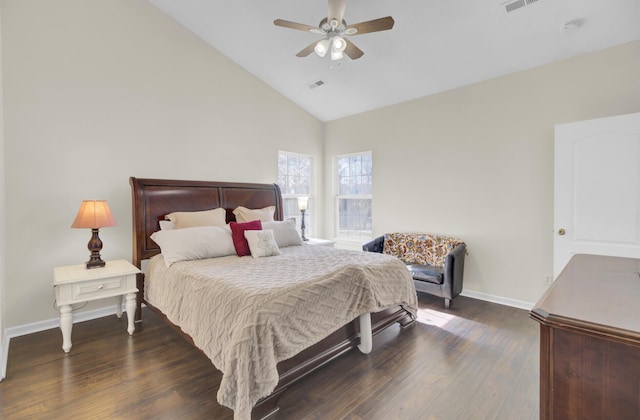 bedroom with ceiling fan, dark wood-type flooring, and high vaulted ceiling