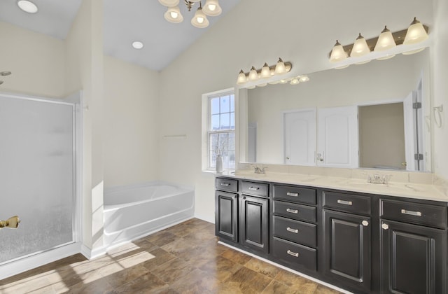 bathroom with shower with separate bathtub and vanity