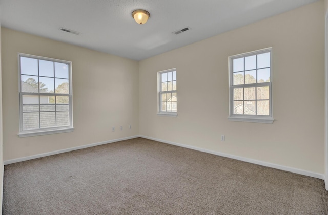 view of carpeted spare room