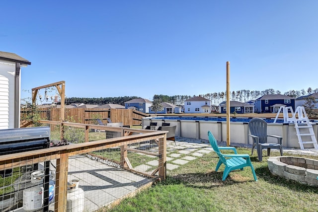 view of yard featuring a fire pit