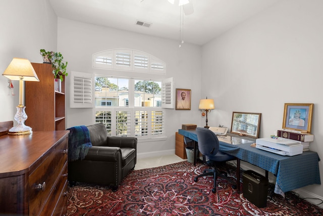 office featuring ceiling fan and carpet