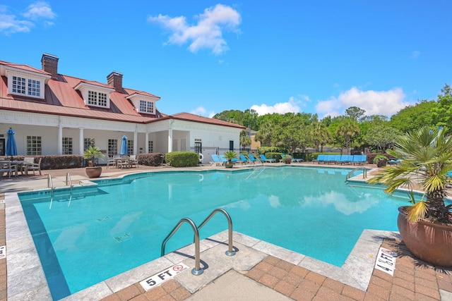 view of pool with a patio