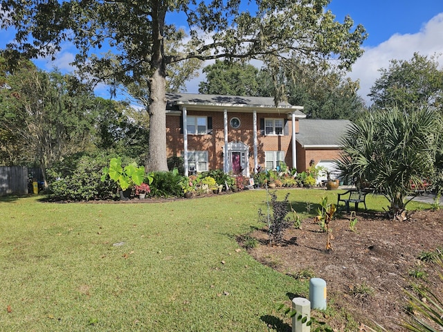 view of front of house with a front lawn