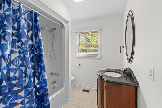 full bath featuring vanity, tile patterned flooring, visible vents, toilet, and shower / bath combo