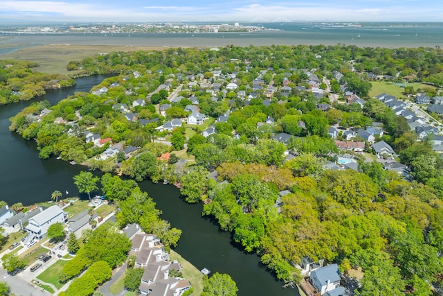 bird's eye view featuring a water view and a residential view