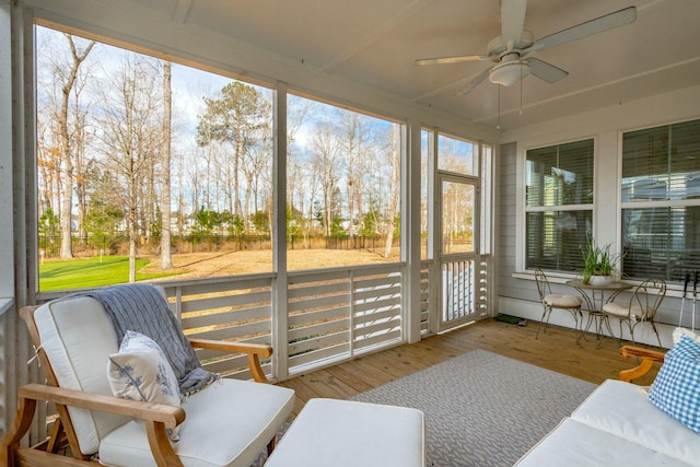 sunroom / solarium with ceiling fan