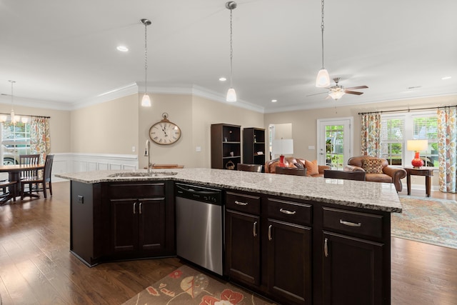 207 Brutus Ln, Summerville, SC 29485 - kitchen featuring stainless steel dishwasher, a sink, wainscoting, ceiling fan, and dark wood-style flooring
