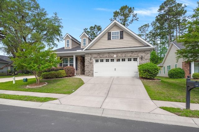 207 Brutus Ln, Summerville, SC 29485 - view of front of home featuring a front lawn, driveway, and brick siding